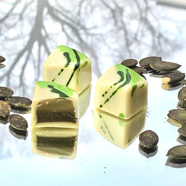 Nebula Artisan Chocolate Pralinen Kurbiskern Kollektion Grune Versuchung