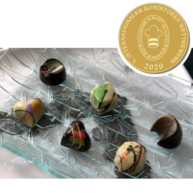 Nebula Artisan Chocolate Pralinen Kurbiskern Kollektion Gold